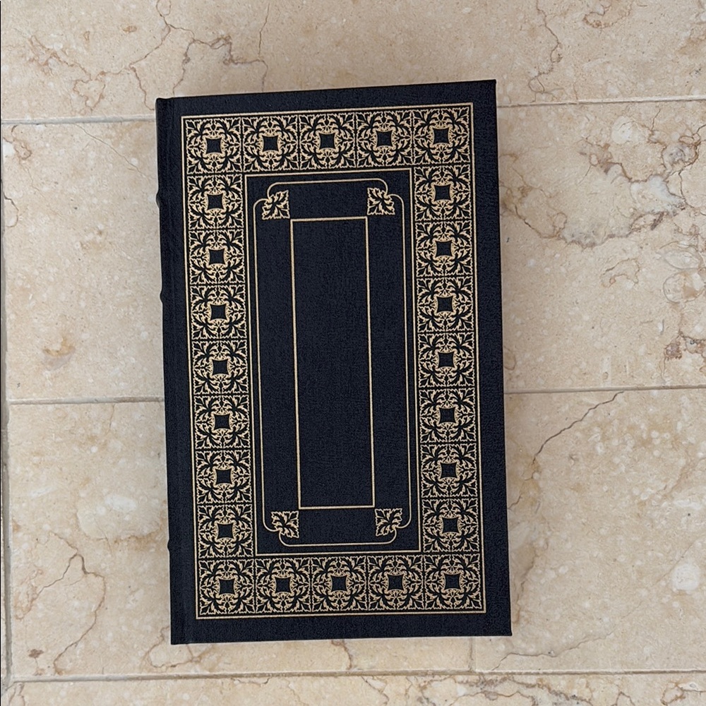 Elegant Black and Gold Decorative Book by Daniel Defoe